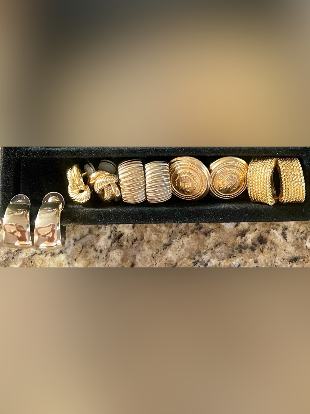 Collection of Gold statement earrings: Clips and pierced